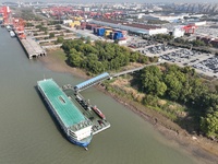 A ro-ro cargo ship loads Chery Group cars destined for the global market at Zhujiaqiao Port area of Anhui Port Group in Wuhu, Anhui province...