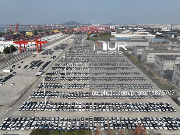 A ro-ro cargo ship loads Chery Group cars destined for the global market at Zhujiaqiao Port area of Anhui Port Group in Wuhu, Anhui province...