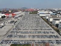 A ro-ro cargo ship loads Chery Group cars destined for the global market at Zhujiaqiao Port area of Anhui Port Group in Wuhu, Anhui province...