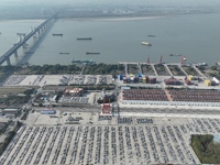 A ro-ro cargo ship loads Chery Group cars destined for the global market at Zhujiaqiao Port area of Anhui Port Group in Wuhu, Anhui province...