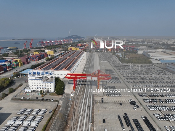 A ro-ro cargo ship loads Chery Group cars destined for the global market at Zhujiaqiao Port area of Anhui Port Group in Wuhu, Anhui province...