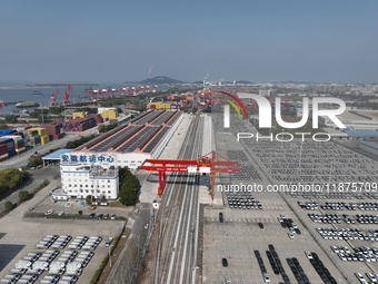 A ro-ro cargo ship loads Chery Group cars destined for the global market at Zhujiaqiao Port area of Anhui Port Group in Wuhu, Anhui province...