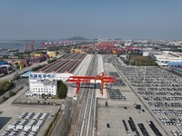 A ro-ro cargo ship loads Chery Group cars destined for the global market at Zhujiaqiao Port area of Anhui Port Group in Wuhu, Anhui province...