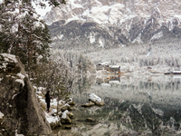 Hikers are at Eibsee in Grainau, Bavaria, Germany, on December 13, 2024. The lake is located 9 km southwest of Garmisch-Partenkirchen below...