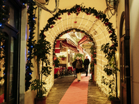 Christmas lights adorn a small alley in Sorrento, Naples, Italy, on December 16, 2024. Sorrento is a town overlooking the Bays of Naples in...