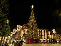 A large Christmas tree lights up Piazza Torquato Tasso in Sorrento, Naples, Italy, on December 16, 2024. Sorrento is a town overlooking the...