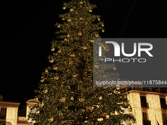 A large Christmas tree adorns Piazza Torquato Tasso in Sorrento, Naples, Italy, on December 16, 2024. Sorrento is a town overlooking the Bay...