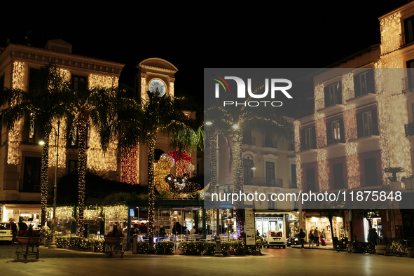 Christmas lights adorn Piazza Torquato Tasso in Sorrento, Naples, Italy, on December 16, 2024. Sorrento is a town overlooking the Bays of Na...