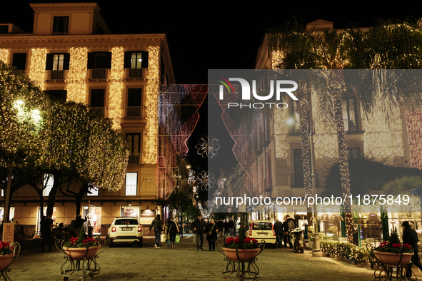 Christmas lights adorn Piazza Torquato Tasso in Sorrento, Naples, Italy, on December 16, 2024. Sorrento is a town overlooking the Bays of Na...