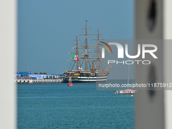 The Amerigo Vespucci, the historic sailing ship and training ship of the Italian navy, docks in Old Doha Port, Qatar, on December 17, 2024,...