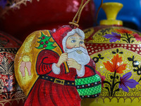 Christmas ornaments, including Santa Claus, are ready at the workshop before being sent to the market ahead of Christmas celebrations in Sri...