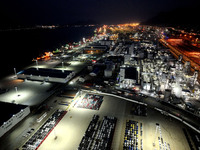 A photo taken on the evening of December 18, 2024, shows the working scene of the terminal at Lianyungang Port in Lianyungang, China, on Dec...