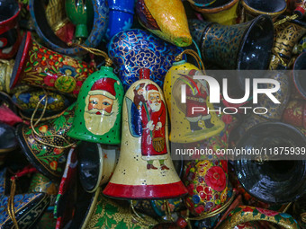 Christmas ornaments are ready at the workshop before being sent to the market ahead of Christmas celebrations in Srinagar, Jammu and Kashmir...