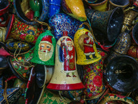 Christmas ornaments are ready at the workshop before being sent to the market ahead of Christmas celebrations in Srinagar, Jammu and Kashmir...