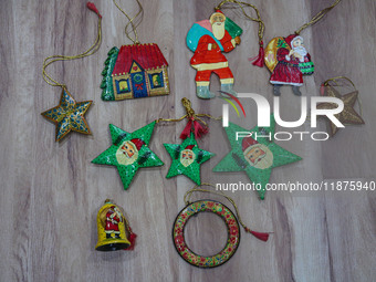 Christmas ornaments are ready at the workshop before being sent to the market ahead of Christmas celebrations in Srinagar, Jammu and Kashmir...