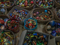 Christmas ornaments are ready at the workshop before being sent to the market ahead of Christmas celebrations in Srinagar, Jammu and Kashmir...