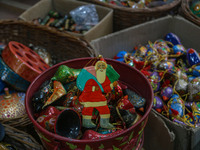 Christmas ornaments are ready at the workshop before being sent to the market ahead of Christmas celebrations in Srinagar, Jammu and Kashmir...