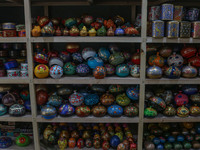 Christmas ornaments are ready at the workshop before being sent to the market ahead of Christmas celebrations in Srinagar, Jammu and Kashmir...