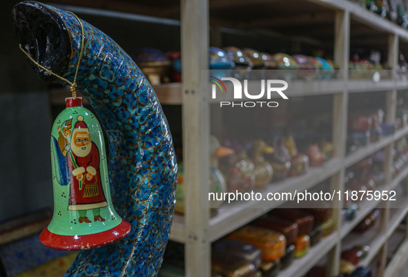 Christmas ornaments are ready at the workshop before being sent to the market ahead of Christmas celebrations in Srinagar, Jammu and Kashmir...