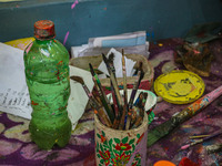 Brushes and colors used in papier-mache decoration are seen at the workshop in Srinagar, Jammu and Kashmir, on December 17, 2024. Artisans i...