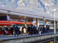 Travelers are at the Deutsche Bahn Regional Train Station in Garmisch-Partenkirchen, Bavaria, Germany, on December 13, 2024. (