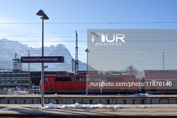 A Deutsche Bahn regional train is at the station in Garmisch-Partenkirchen, Bavaria, Germany, on December 13, 2024. 