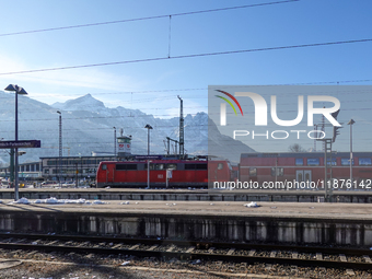 A Deutsche Bahn regional train is at the station in Garmisch-Partenkirchen, Bavaria, Germany, on December 13, 2024. (