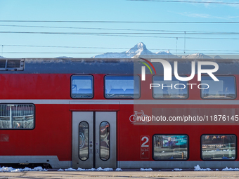 A Deutsche Bahn regional train is at the station in Garmisch-Partenkirchen, Bavaria, Germany, on December 13, 2024. (