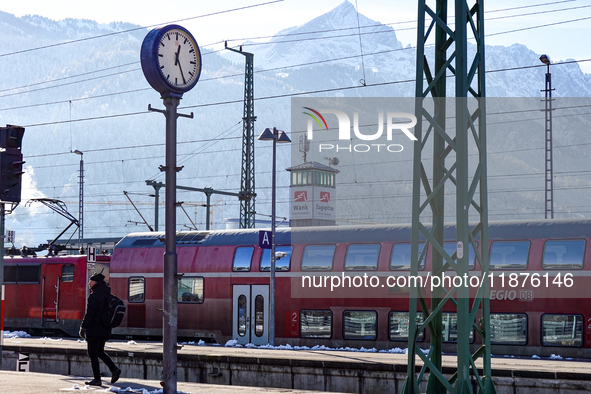 A Deutsche Bahn regional train is at the station in Garmisch-Partenkirchen, Bavaria, Germany, on December 13, 2024. 