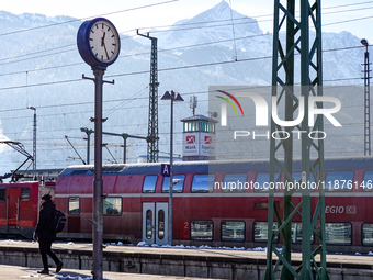 A Deutsche Bahn regional train is at the station in Garmisch-Partenkirchen, Bavaria, Germany, on December 13, 2024. (