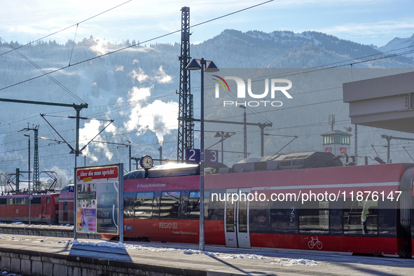 A Deutsche Bahn regional train is at the station in Garmisch-Partenkirchen, Bavaria, Germany, on December 13, 2024. 