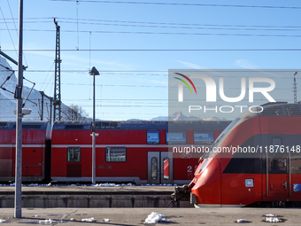 A Deutsche Bahn regional train is at the station in Garmisch-Partenkirchen, Bavaria, Germany, on December 13, 2024. (