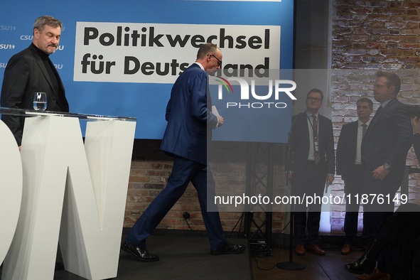 Friedrich Merz, CDU Federal Chairman and CDU/CSU Parliamentary Group Leader, and Markus Soder, the Prime Minister of Bavaria (CSU), speak to...