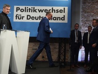 Friedrich Merz, CDU Federal Chairman and CDU/CSU Parliamentary Group Leader, and Markus Soder, the Prime Minister of Bavaria (CSU), speak to...