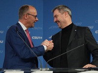 Friedrich Merz, CDU Federal Chairman and CDU/CSU Parliamentary Group Leader, and Markus Soder, the Prime Minister of Bavaria (CSU), speak to...