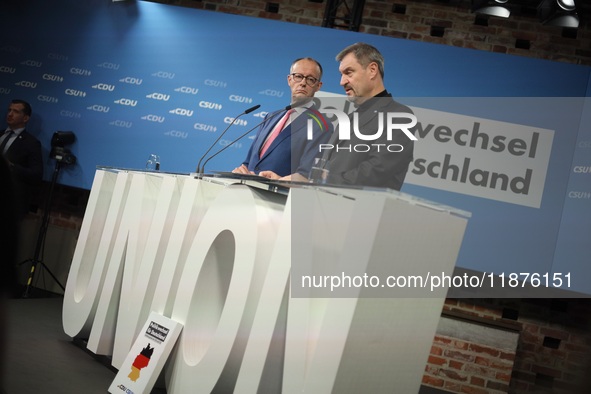 Friedrich Merz, CDU Federal Chairman and CDU/CSU Parliamentary Group Leader, and Markus Soder, the Prime Minister of Bavaria (CSU), speak to...