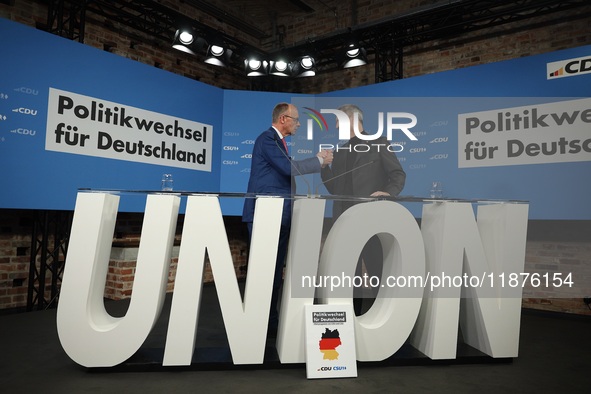 Friedrich Merz, CDU Federal Chairman and CDU/CSU Parliamentary Group Leader, and Markus Soder, the Prime Minister of Bavaria (CSU), speak to...