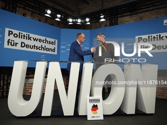 Friedrich Merz, CDU Federal Chairman and CDU/CSU Parliamentary Group Leader, and Markus Soder, the Prime Minister of Bavaria (CSU), speak to...