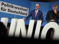 Friedrich Merz, CDU Federal Chairman and CDU/CSU Parliamentary Group Leader, and Markus Soder, the Prime Minister of Bavaria (CSU), speak to...