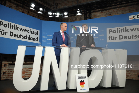 Friedrich Merz, CDU Federal Chairman and CDU/CSU Parliamentary Group Leader, and Markus Soder, the Prime Minister of Bavaria (CSU), speak to...