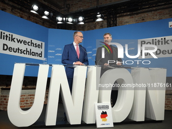 Friedrich Merz, CDU Federal Chairman and CDU/CSU Parliamentary Group Leader, and Markus Soder, the Prime Minister of Bavaria (CSU), speak to...