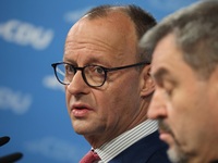 Friedrich Merz, CDU Federal Chairman and CDU/CSU Parliamentary Group Leader, and Markus Soder, the Prime Minister of Bavaria (CSU), speak to...