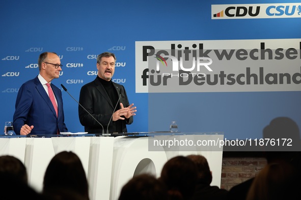 Friedrich Merz, CDU Federal Chairman and CDU/CSU Parliamentary Group Leader, and Markus Soder, the Prime Minister of Bavaria (CSU), speak to...