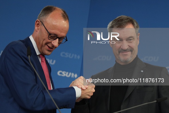 Friedrich Merz, CDU Federal Chairman and CDU/CSU Parliamentary Group Leader, and Markus Soder, the Prime Minister of Bavaria (CSU), speak to...