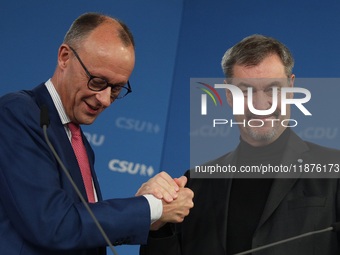 Friedrich Merz, CDU Federal Chairman and CDU/CSU Parliamentary Group Leader, and Markus Soder, the Prime Minister of Bavaria (CSU), speak to...