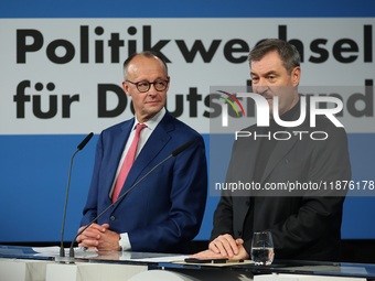 Friedrich Merz, CDU Federal Chairman and CDU/CSU Parliamentary Group Leader, and Markus Soder, the Prime Minister of Bavaria (CSU), speak to...