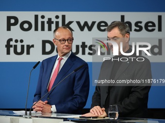 Friedrich Merz, CDU Federal Chairman and CDU/CSU Parliamentary Group Leader, and Markus Soder, the Prime Minister of Bavaria (CSU), speak to...