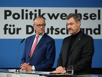 Friedrich Merz, CDU Federal Chairman and CDU/CSU Parliamentary Group Leader, and Markus Soder, the Prime Minister of Bavaria (CSU), speak to...