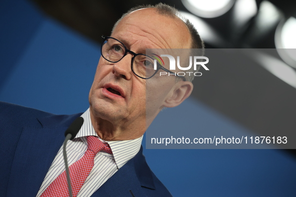 Friedrich Merz, CDU Federal Chairman and CDU/CSU Parliamentary Group Leader, and Markus Soder, the Prime Minister of Bavaria (CSU), speak to...