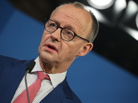 Friedrich Merz, CDU Federal Chairman and CDU/CSU Parliamentary Group Leader, and Markus Soder, the Prime Minister of Bavaria (CSU), speak to...